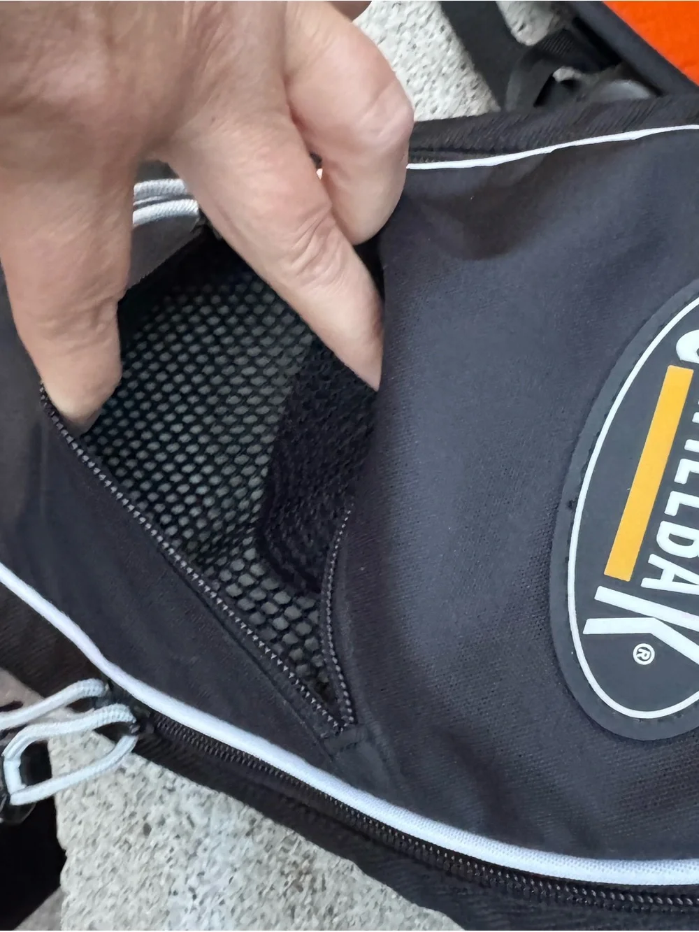 CamelBak Black Hydration Backpack with Orange Interior